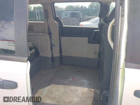 2008 Dodge Grand Caravan SE z VIN 1D8HN44H98B138469, wystawiony jako IAAI lot #42373055 z przebiegiem 149 399 mil mil oraz . Historia ofert i sprzedaży dostępna na DreamBid. Obrazek 8.
