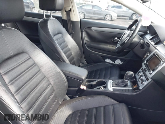 2013 Volkswagen CC Sport with VIN WVWBN7AN9DE516590, listed as a IAAI auction lot 41684586 with 153,312 mi miles. Bid and sale history available at carsss.com. Image 5.