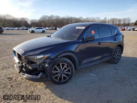 2018 Mazda CX-5 Touring with VIN JM3KFACM4J0470374, listed as a Copart auction lot 43048035 with 125,440 mi miles and Salvage Title. Bid and sale history available at carsss.com. Image 1.