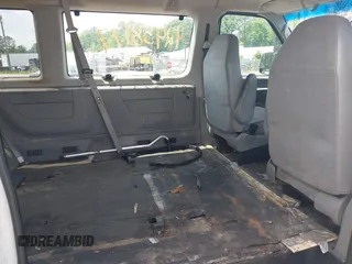 2003 Ford Econoline Passenger XL z VIN 1FBNE31L23HA12422, wystawiony jako IAAI lot #42458177 z przebiegiem 121 505 mil mil oraz . Historia ofert i sprzedaży dostępna na DreamBid. Obrazek 8.