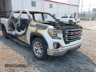 2019 GMC Sierra 1500 SLT z VIN 3GTU9DED7KG231521, wystawiony jako IAAI lot #41898799 z przebiegiem Nie podano mil oraz . Historia ofert i sprzedaży dostępna na DreamBid. Obrazek 1.