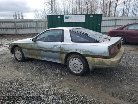1988 Toyota Supra with VIN JT2MA70J7J0097790, listed as a Copart auction lot 50250145 with 131,411 mi miles and Clean title. Bid and sale history available at DreamBid. Image 2.