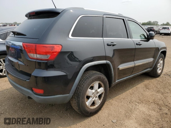 2011 Jeep Grand Cherokee Laredo with VIN 1J4RR4GGXBC567450, listed as a Copart auction lot 60056085 with 165,077 mi miles and Salvage title. Bid and sale history available at DreamBid. Image 3.