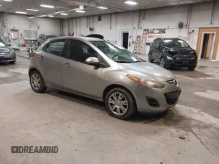 2012 Mazda 2 Sport with VIN JM1DE1KZ0C0149808, listed as a IAAI auction lot 42233078 with 166,111 mi miles and . Bid and sale history available at DreamBid. Image 1.