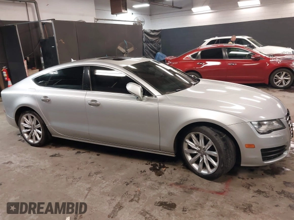 2012 Audi A7 z VIN WAUWGCFC2CN091270, wystawiony jako IAAI lot #41261927 z przebiegiem 109 756 mil mil oraz . Historia ofert i sprzedaży dostępna na DreamBid. Obrazek 13.