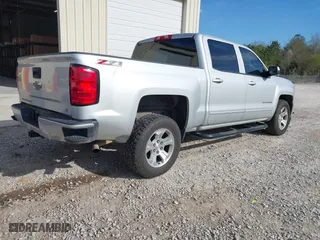 2016 Chevrolet Silverado 1500 LT with VIN 3GCUKREC4GG278179, listed as a IAAI auction lot 41863441 with 158,718 mi miles. Bid and sale history available at carsss.com. Image 4.