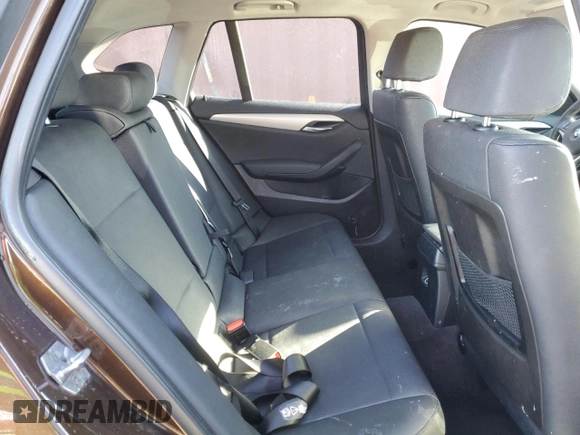 2015 BMW X1 sDrive28i with VIN WBAVM1C54FV316825, listed as a Copart auction lot 83592644 with 76,823 mi miles and Salvage Title. Bid and sale history available at carsss.com. Image 11.