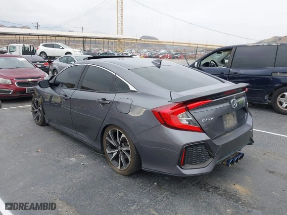 2018 Honda Civic Si Sedan with VIN 2HGFC1E53JH701058, listed as a IAAI auction lot 41457392 with 117,581 mi miles. Bid and sale history available at carsss.com. Image 3.