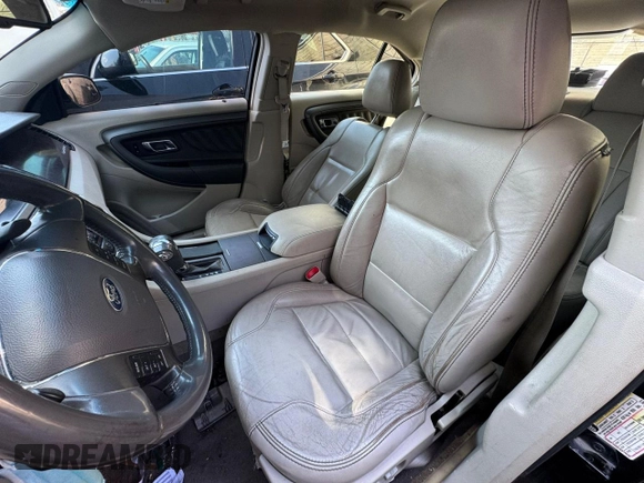 2011 Ford Taurus SEL z VIN 1FAHP2EW8BG138540, wystawiony jako Copart lot #56559815 z przebiegiem 286 211 mil mil oraz Tytuł czysty. Historia ofert i sprzedaży dostępna na DreamBid. Obrazek 5.