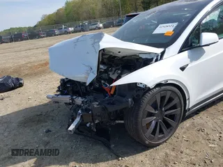 2022 Tesla Model X Plaid z VIN 7SAXCBE6XNF340704, wystawiony jako IAAI lot #41928524 z przebiegiem Nie podano mil oraz . Historia ofert i sprzedaży dostępna na DreamBid. Obrazek 6.