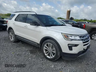 2018 Ford Explorer XLT с VIN 1FM5K7D84JGA31474, выставлен на аукционе Copart как лот 61496645 с пробегом 167 559 миль миль и Списание • Salvage title. История ставок и продаж доступна на DreamBid. Изображение 4.