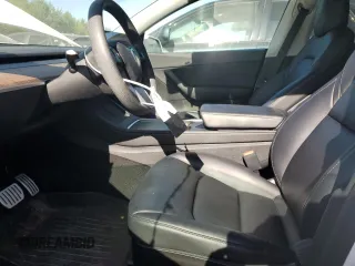2022 Tesla Model Y Performance with VIN 7SAYGDEFXNF396758, listed as a Copart auction lot 59006365 with 47,882 mi miles and Salvage title. Bid and sale history available at DreamBid. Image 7.