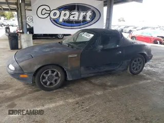 1995 Mazda MX-5 Miata with VIN JM1NA3530S0614928, listed as a Copart auction lot 63698285 with 242,635 mi miles and Clean title. Bid and sale history available at DreamBid. Image 1.