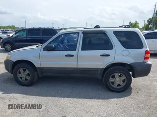 2005 Ford Escape XLS Value with VIN 1FMYU02Z35KD87671, listed as a IAAI auction lot 41880824 with 278,689 mi miles. Bid and sale history available at carsss.com. Image 14.