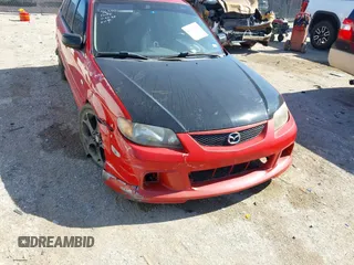 2002 Mazda Protege z VIN JM1BJ245221631014, wystawiony jako IAAI lot #42232912 z przebiegiem 180 184 mil mil oraz . Historia ofert i sprzedaży dostępna na DreamBid. Obrazek 1.