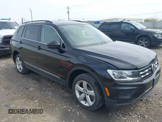 2021 Volkswagen Tiguan SE with VIN 3VV2B7AX4MM050282, listed as a IAAI auction lot 42124808 with 80,082 mi miles and . Bid and sale history available at DreamBid. Image 1.