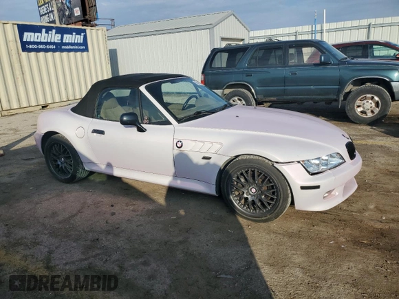 2001 BMW Z3 3.0 with VIN WBACN53421LL47532, listed as a Copart auction lot 86485874 with 140,590 mi miles and Salvage title. Bid and sale history available at DreamBid. Image 4.