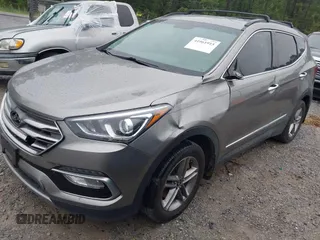 2017 Hyundai Santa Fe 2.4L z VIN 5XYZU3LB8HG421397, wystawiony jako IAAI lot #41961915 z przebiegiem 102 594 mil mil oraz . Historia ofert i sprzedaży dostępna na DreamBid. Obrazek 2.