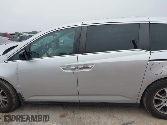 2012 Honda Odyssey EX with VIN 5FNRL5H47CB093480, listed as a IAAI auction lot 42067202 with 81,818 mi miles and . Bid and sale history available at carsss.com. Image 14.