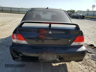 2002 Mitsubishi Lancer ES with VIN JA3AJ26E72U062280, listed as a Copart auction lot 75810384 with 136,149 mi miles and Salvage Title. Bid and sale history available at DreamBid. Image 6.