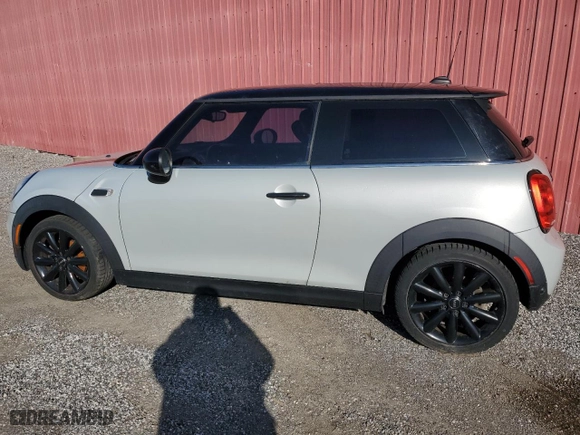 2017 MINI Hardtop 2 Door Cooper with VIN WMWXP5C53H3B77988, listed as a Copart auction lot 52147565 with 130,809 mi miles and Clean Title. Bid and sale history available at carsss.com. Image 2.
