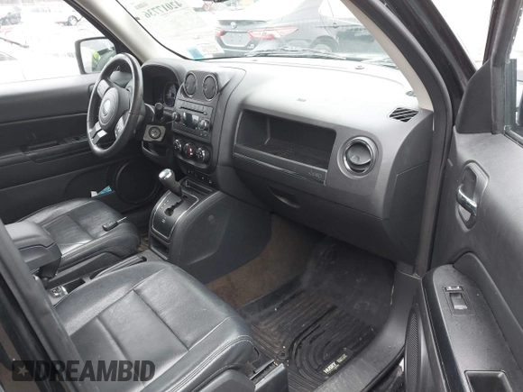 2016 Jeep Patriot Latitude with VIN 1C4NJRFB1GD523904, listed as a IAAI auction lot 42017736 with 164,705 mi miles. Bid and sale history available at carsss.com. Image 5.