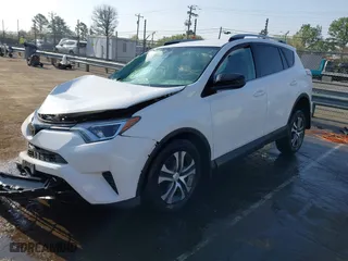 2018 Toyota RAV4 LE with VIN 2T3BFREV5JW854513, listed as a IAAI auction lot 41804823 with 138,476 mi miles. Bid and sale history available at carsss.com. Image 18.