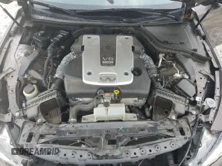 2015 Infiniti Q50 Premium z VIN JN1BV7AP5FM353448, wystawiony jako Copart lot #57115325 z przebiegiem 104 721 mil mil oraz Szkoda całkowita • Salvage title. Historia ofert i sprzedaży dostępna na DreamBid. Obrazek 11.