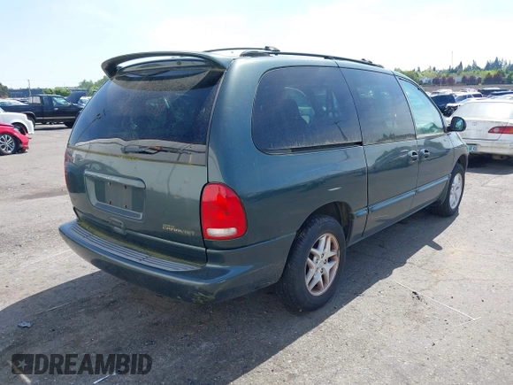 2000 Dodge Grand Caravan with VIN 1B4GT44L4YB583087, listed as a IAAI auction lot 42081647 with Not Provided miles and . Bid and sale history available at DreamBid. Image 4.