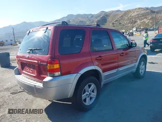 2005 Ford Escape with VIN 1FMYU95H55KC30313, listed as a IAAI auction lot 42475739 with 398,748 mi miles and . Bid and sale history available at DreamBid. Image 4.