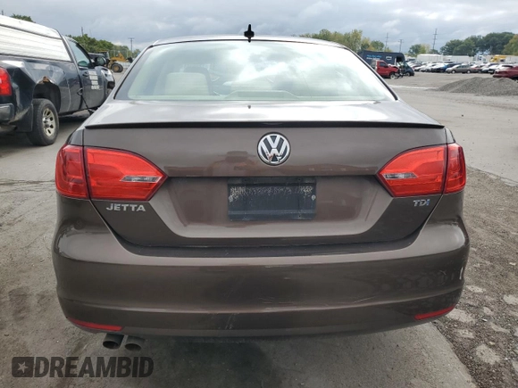 2012 Volkswagen Jetta TDI с VIN 3VWLL7AJ3CM334185, выставлен на аукционе Copart как лот 72563414 с пробегом 133 180 миль миль и Списание • Salvage title. История ставок и продаж доступна на DreamBid. Изображение 6.