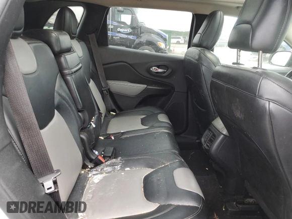 2014 Jeep Cherokee Limited with VIN 1C4PJLDB1EW301647, listed as a Copart auction lot 56169585 with 140,784 mi miles and Salvage title. Bid and sale history available at DreamBid. Image 10.