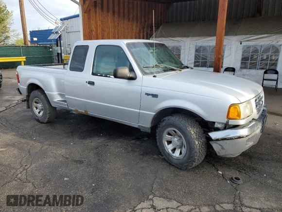 2003 Ford Ranger XL with VIN 1FTYR14U43PB50930, listed as a Copart auction lot 55161185 with 213,771 mi miles and Salvage title. Bid and sale history available at DreamBid. Image 4.