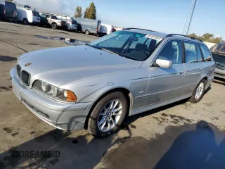 2003 BMW 5 Series 525iAT with VIN WBADS43463GE11741, listed as a Copart auction lot 80497004 with 166,198 mi miles and Clean Title. Bid and sale history available at carsss.com. Image 1.