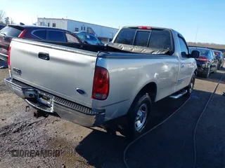 2002 Ford F-150 XL with VIN 1FTRF17242NA48027, listed as a IAAI auction lot 41838636 with 69,821 mi miles. Bid and sale history available at carsss.com. Image 4.