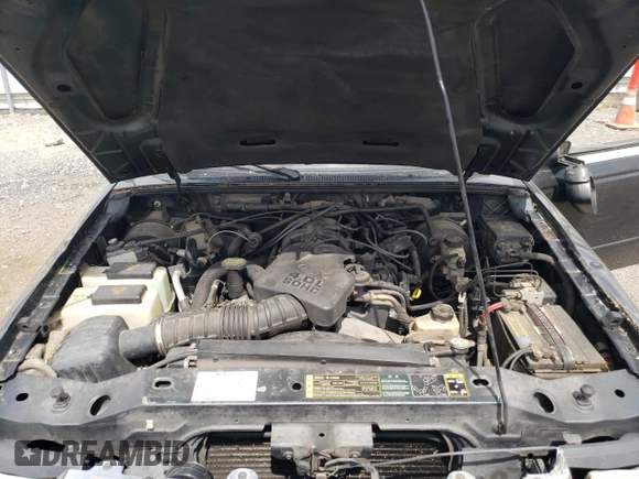 2005 Ford Ranger XLT z VIN 1FTZR45E65PA93596, wystawiony jako Copart lot #54162995 z przebiegiem 168 574 mil mil oraz Nie do naprawy • Non repairable. Historia ofert i sprzedaży dostępna na DreamBid. Obrazek 11.
