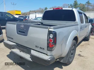 2011 Nissan Frontier Pro-4X with VIN 1N6AD0EVXBC407089, listed as a IAAI auction lot 42113537 with 124,853 mi miles and . Bid and sale history available at DreamBid. Image 4.
