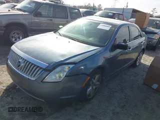 2011 Mercury Milan with VIN 3MEHM0HA2BR601822, listed as a IAAI auction lot 41282889 with 214,389 mi miles. Bid and sale history available at carsss.com. Image 2.