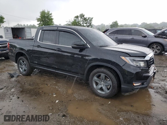 2023 Honda Ridgeline RTL with VIN 5FPYK3F51PB067811, listed as a Copart auction lot 56795995 with 21,500 mi miles and Salvage title. Bid and sale history available at DreamBid. Image 4.