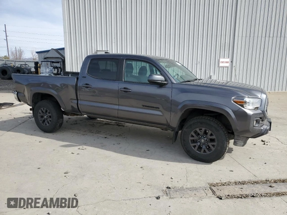 2021 Toyota Tacoma 4WD SR5 with VIN 5TFDZ5BN5MX064934, listed as a Copart auction lot 48400035 with 59,767 mi miles and Salvage Title. Bid and sale history available at carsss.com. Image 4.