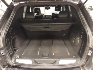 2016 Jeep Grand Cherokee Limited 75th Anniversary with VIN 1C4RJFBGXGC425705, listed as a IAAI auction lot 41779755 with 142,711 mi miles. Bid and sale history available at carsss.com. Image 18.