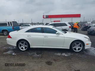 2009 Mercedes-Benz CLS-Class 5.5L with VIN WDDDJ72X79A140979, listed as a IAAI auction lot 41802317 with 195,968 mi miles. Bid and sale history available at carsss.com. Image 13.