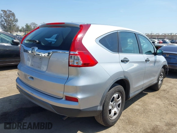 2015 Honda CR-V LX with VIN 3CZRM3H37FG706005, listed as a IAAI auction lot 41968907 with 107,690 mi miles and . Bid and sale history available at carsss.com. Image 4.