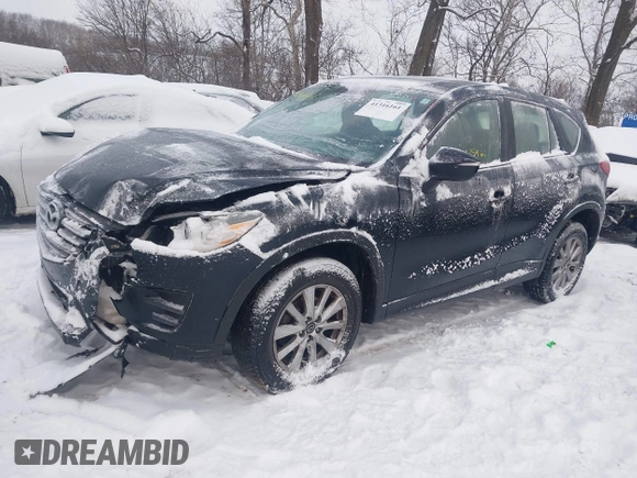 2016 Mazda CX-5 Sport z VIN JM3KE4BY0G0919017, wystawiony jako IAAI lot #41316161 z przebiegiem 209 259 mil mil oraz . Historia ofert i sprzedaży dostępna na DreamBid. Obrazek 17.