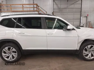 2021 Volkswagen Atlas SE z VIN 1V2HR2CA3MC539997, wystawiony jako IAAI lot #41977786 z przebiegiem 77 372 mil mil oraz . Historia ofert i sprzedaży dostępna na DreamBid. Obrazek 14.