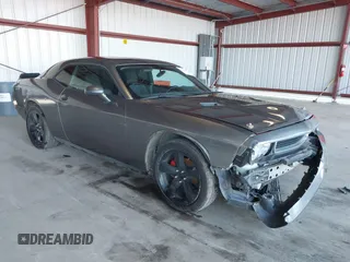 2011 Dodge Challenger z VIN 2B3CJ4DG0BH570332, wystawiony jako IAAI lot #41399707 z przebiegiem 189 590 mil mil oraz . Historia ofert i sprzedaży dostępna na DreamBid. Obrazek 1.