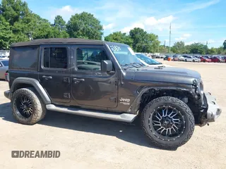 2018 Jeep Wrangler Unlimited Sport S с VIN 1C4HJXDN6JW277829, выставлен на аукционе IAAI как лот 42607187 с пробегом 107 461 миль миль и . История ставок и продаж доступна на DreamBid. Изображение 13.