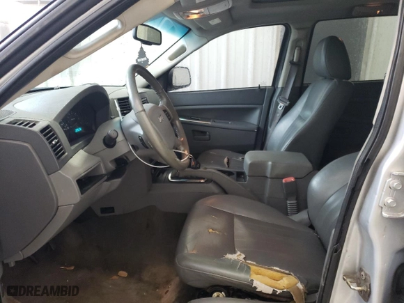 2006 Jeep Grand Cherokee Laredo with VIN 1J4GR48K56C287189, listed as a Copart auction lot 53885965 with 261,125 mi miles and Clean Title. Bid and sale history available at carsss.com. Image 7.
