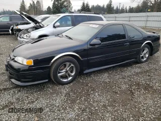 1997 Ford Thunderbird LX with VIN 1FALP62W1VH110468, listed as a Copart auction lot 88331705 with 84,349 mi miles and Salvage Title. Bid and sale history available at DreamBid. Image 1.