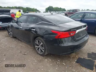 2016 Nissan Maxima SL with VIN 1N4AA6AP5GC413627, listed as a IAAI auction lot 42468940 with 209,558 mi miles and . Bid and sale history available at DreamBid. Image 3.